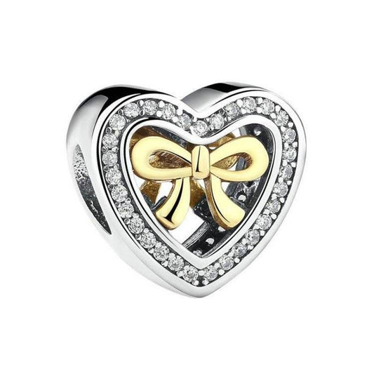 Golden Bow Heart Charm with cubic zirconia accents and 925 sterling silver base, perfect for charm bracelets and romantic jewelry collections.