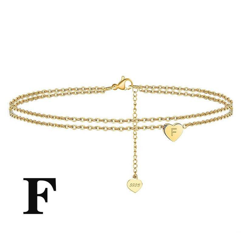Gold-plated Letter Heart Anklet with 'F' engraved charm. Crafted from 925 sterling silver for a stylish and meaningful accessory.