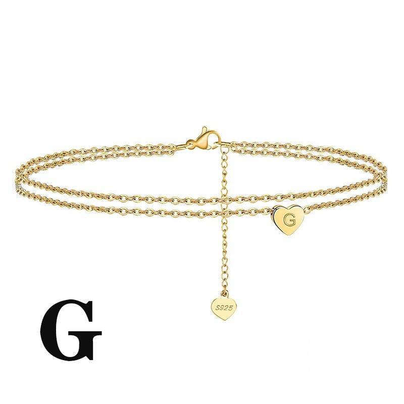Letter Heart Anklet with 'G' engraved charm. Stylish gold-plated design made from 925 sterling silver.