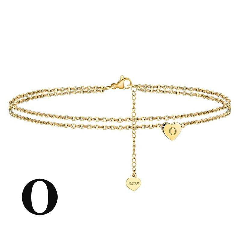 Letter Heart Anklet featuring 'O' engraved charm. Elegant gold-plated design ideal for custom jewelry lovers.