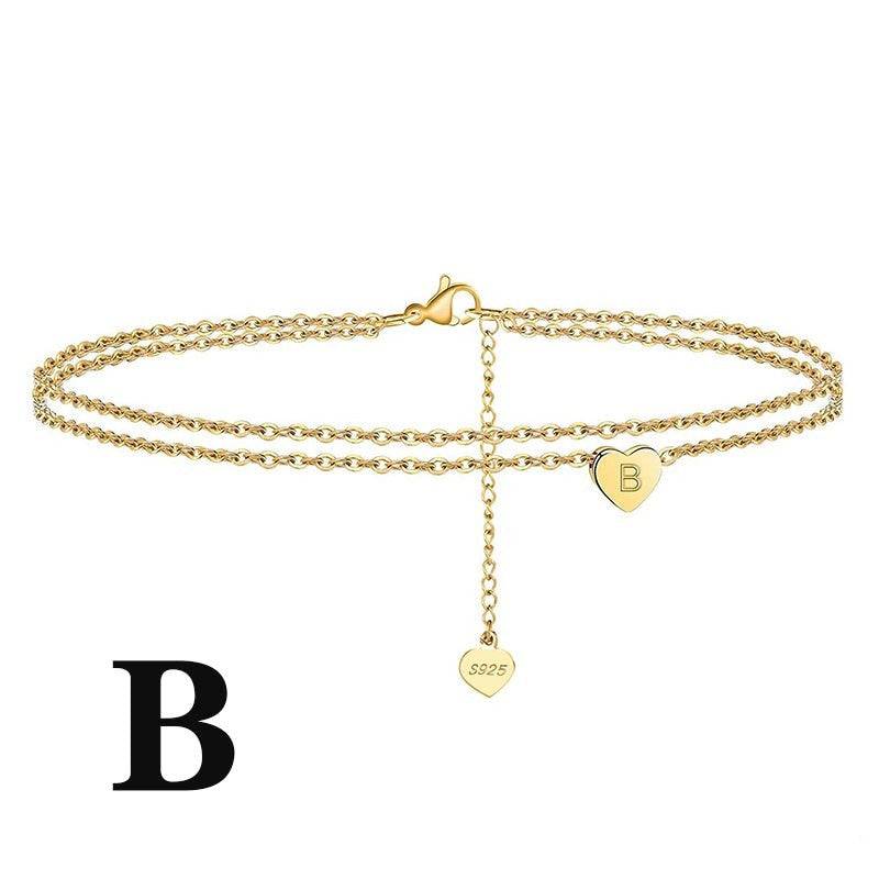 Personalized Letter Heart Anklet with 'B' initial charm in gold finish. Elegant double-layer chain for everyday wear or gifting.