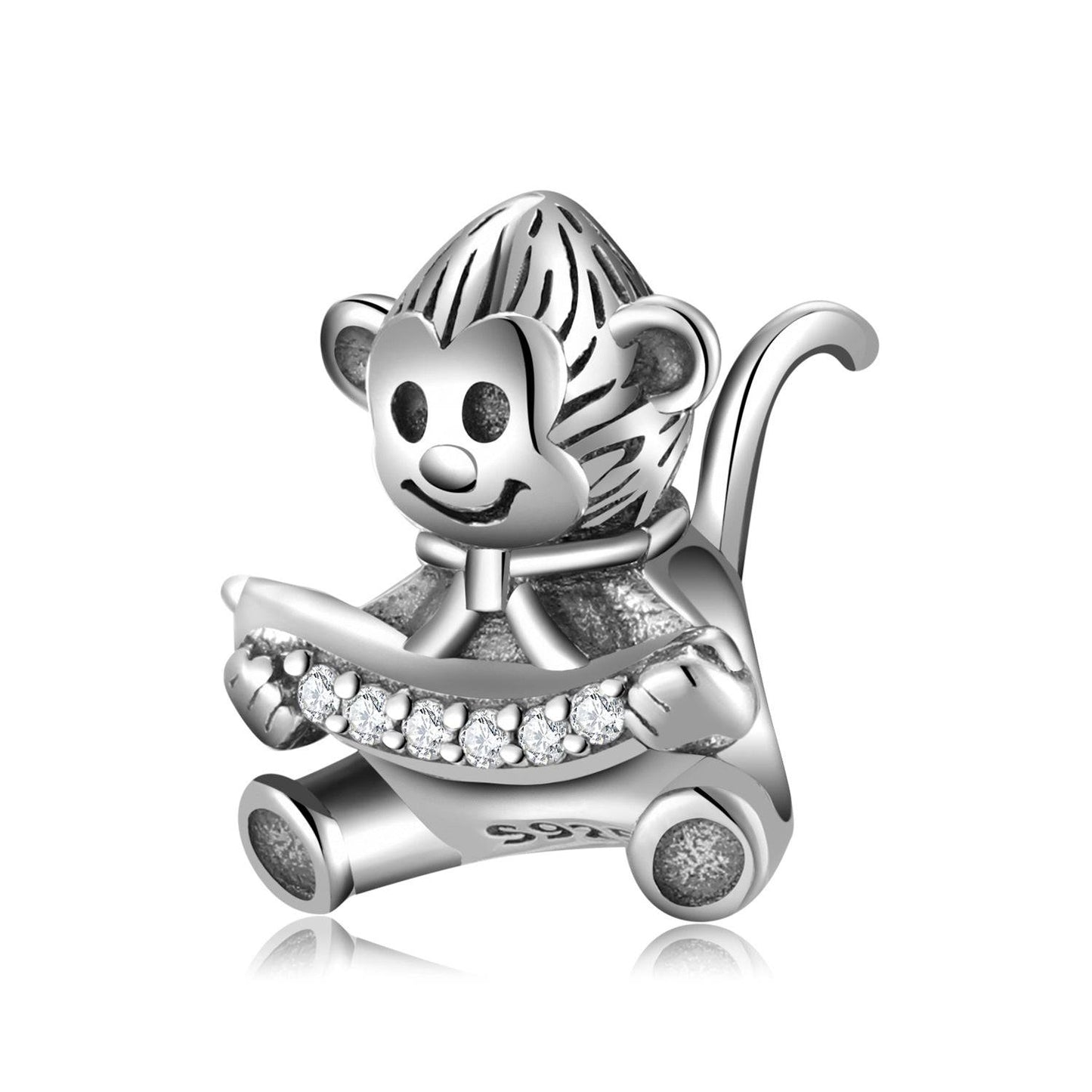 Playful Monkey Charm holding a banana, crafted in silver with sparkling crystal accents. Ideal for adding fun to charm bracelets in jewelry collections.