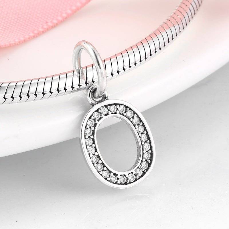 Silver number 0 charm with sparkling rhinestones, ideal for personalized jewelry. Number Charm - Customised Style for Any Occasion ✨