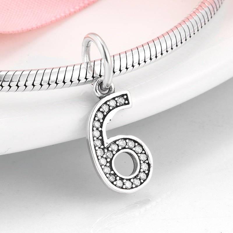 Silver number 6 charm with dazzling rhinestones, ideal for custom jewelry. Number Charm - Customised Style for Any Occasion ✨