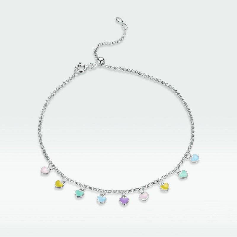 Colourful Rainbow Heart Anklet with pastel heart charms on a sterling silver chain, ideal for adding charm to casual or beach outfits.