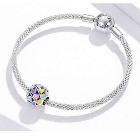 Rainbow Heart Charm - Vibrant Charms for Every Occasion🌈❤️ on a silver mesh bracelet, featuring multicolored enamel hearts. Ideal for charm collectors.