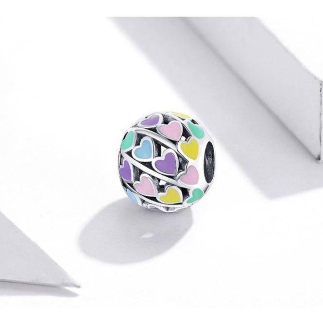 Rainbow Heart Charm - Vibrant Charms for Every Occasion🌈❤️ featuring multicolored enamel hearts on a silver round bead. Ideal for charm bracelets.