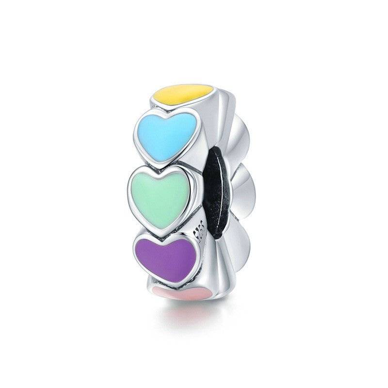 Vibrant Rainbow Heart Spacer charm featuring colorful enamel hearts on a silver base, perfect for adding love and color to your bracelet.