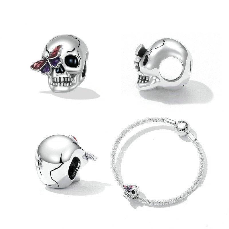 Multiple angles of the Retro Skull Charm for Bracelets, highlighting its intricate butterfly detail and polished silver finish for gothic style.