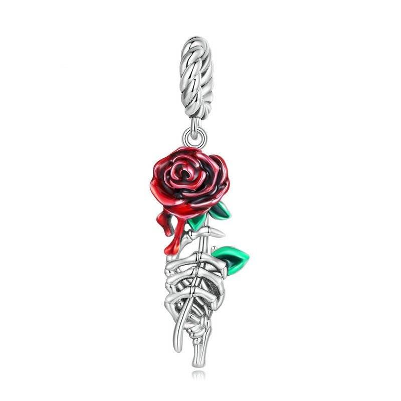 Elegant Scarlet Rose Charm for Bracelets featuring a red enamel rose with green leaves and sterling silver stem. Perfect for romantic jewelry lovers.