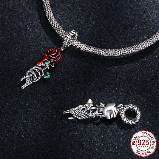 Elegant Scarlet Rose Charm for Bracelets shown on a silver mesh bracelet, highlighting its detailed red rose and 925 sterling silver craftsmanship.