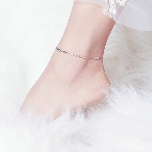 Classic Simple Sterling Silver Anklet worn on ankle, showcasing its elegant and timeless design for everyday or special occasions.