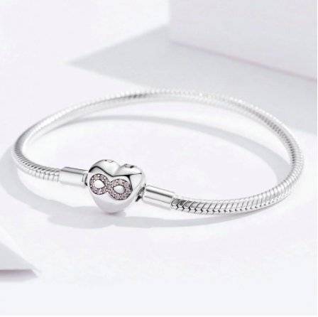 Close-up of the Snake Bone Bracelet highlighting the intricate heart and infinity charm, a standout piece in trendy jewelry.