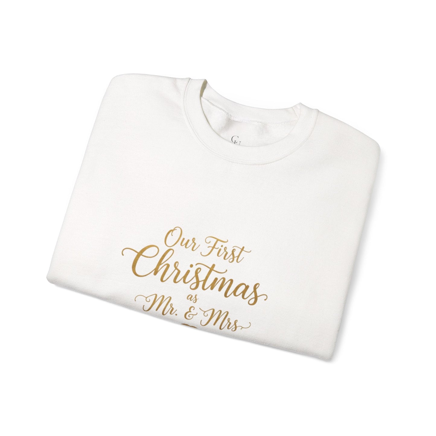 His/Hers Newlyweds Sweatshirt folded in white with gold script reading 'Our First Christmas as Mr. & Mrs.' Ideal holiday apparel for couples.