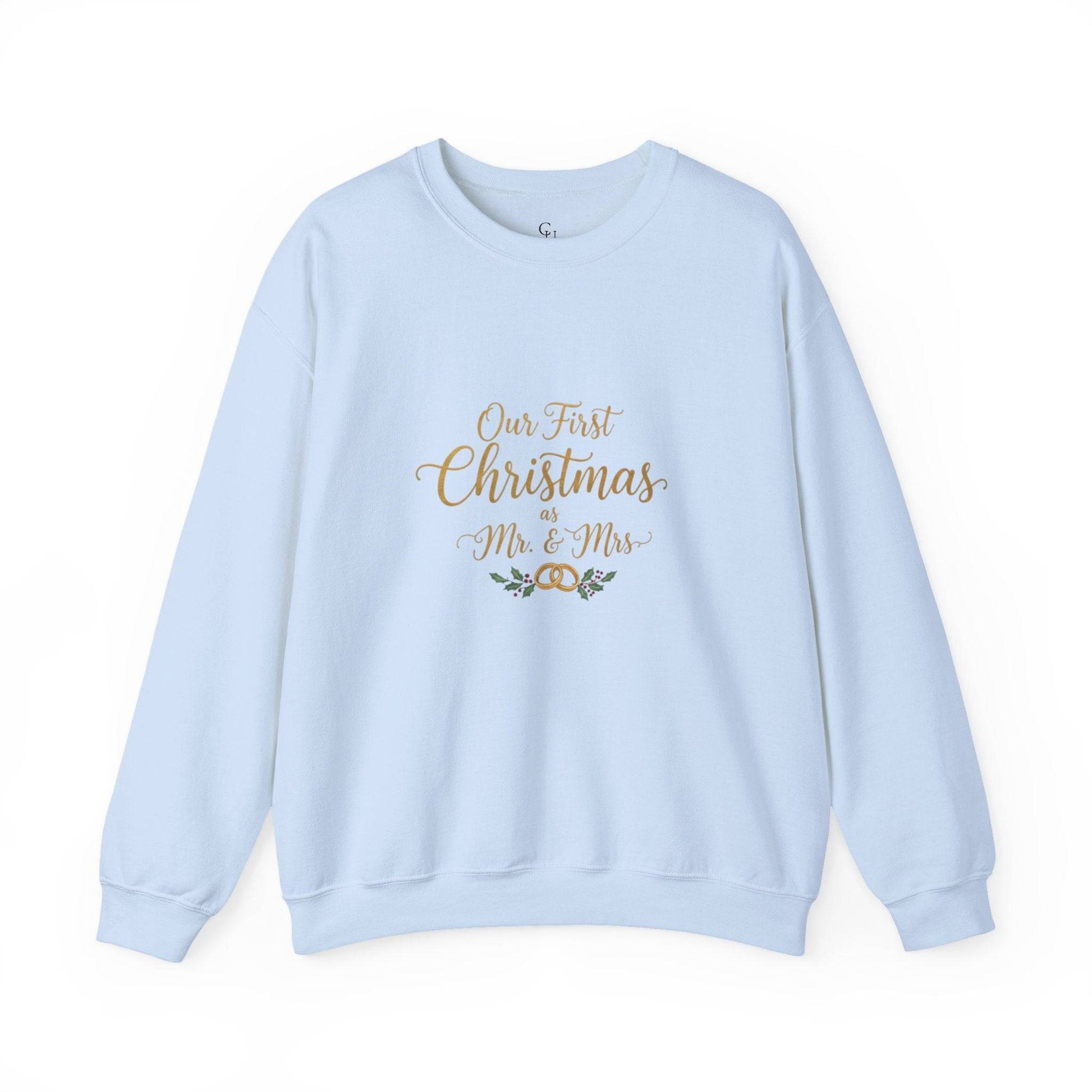 His/Hers Newlyweds Sweatshirt in light blue with 'Our First Christmas as Mr. & Mrs.' gold embroidery. Cozy unisex crewneck for holiday gifting.