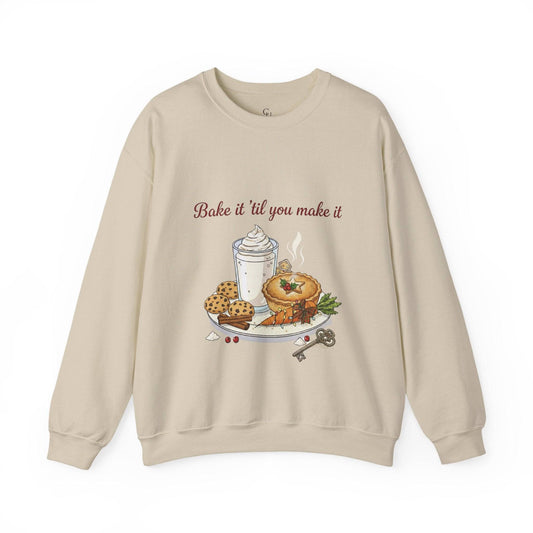 Women’s Sweatshirt - “Bake it ‘til you make it” in beige with embroidered pie, cookies, and whipped drink design. Cozy holiday apparel for wine lovers.
