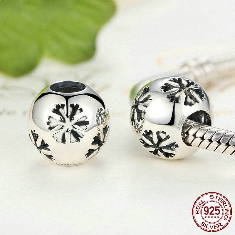 Silver Snowflake Bead Charm - Winter Jewellery | Timeless Design featuring intricate snowflake engravings on 92.5% sterling silver charm bead.
