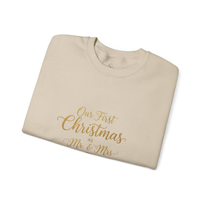 His/Hers Newlyweds Sweatshirt with 'Our First Christmas as Mr. & Mrs.' gold script embroidery, folded on a white background. Ideal holiday apparel gift.