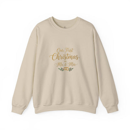 His/Hers Newlyweds Sweatshirt with 'Our First Christmas as Mr. & Mrs.' text in gold script, ideal holiday apparel for couples. Cozy unisex crewneck in beige.