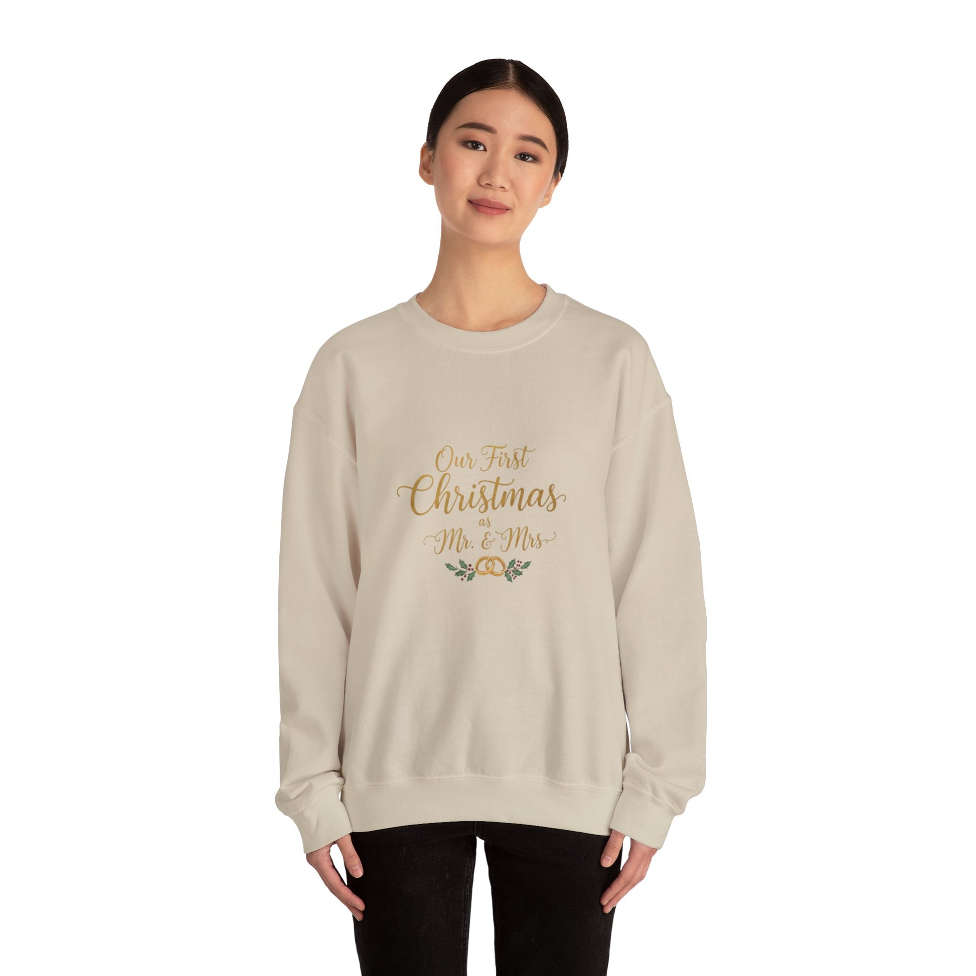 His/Hers Newlyweds Sweatshirt with 'Our First Christmas Mr. & Mrs.' gold and green embroidery, perfect for holiday gifting and cozy winter wear.