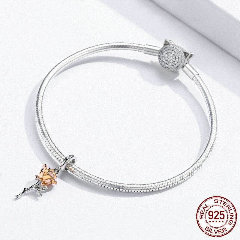 Bracelet with gold rose charm in sterling silver