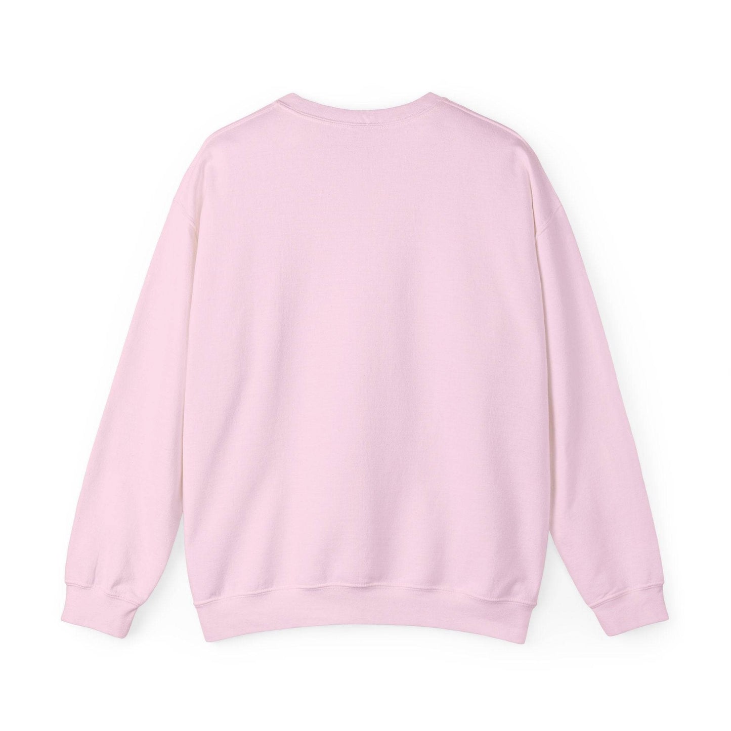 Back view of Women’s Sweatshirt - “Bake it ‘til you make it” in pastel pink, showcasing cozy unisex crewneck design for casual and holiday wear.