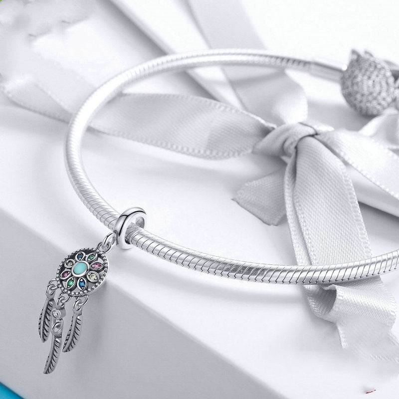 Dreamcatcher charm on silver bracelet with bow