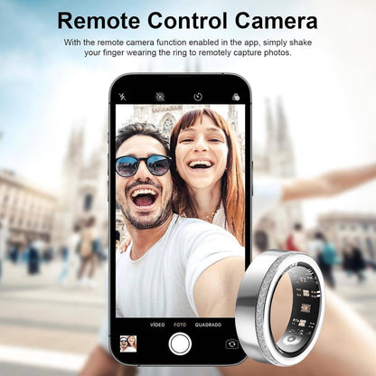 2025 Fitness & Health Tracking Smart Ring for Women shown controlling a smartphone camera remotely. Sleek silver design with wellness sensors.