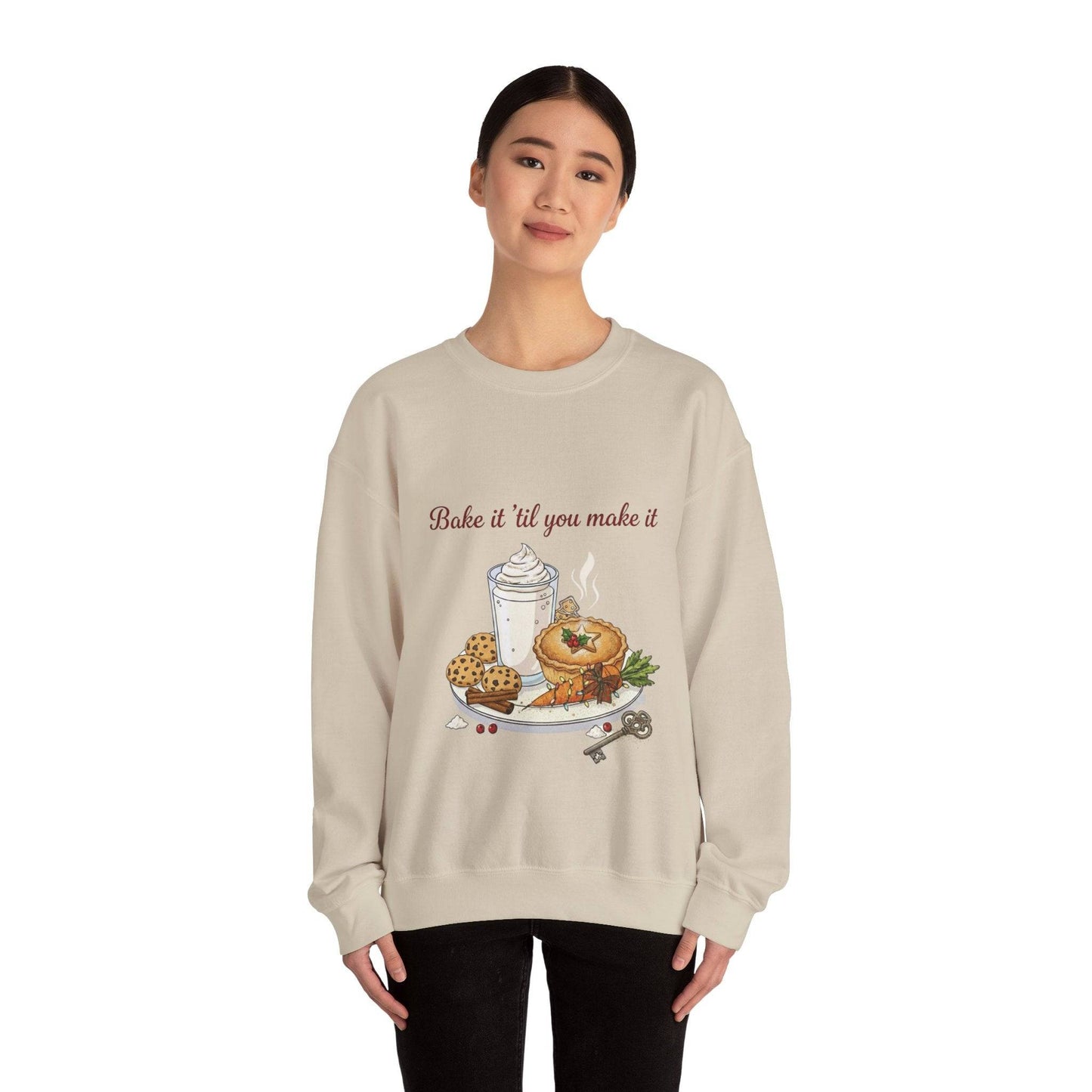Women’s Sweatshirt - “Bake it ‘til you make it” features cozy food and wine-themed embroidery with cookies, coffee, and bagel on beige crewneck.