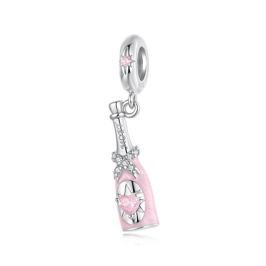 Silver and pink charm with 'Real Sterling Silver 925' stamp on a white background