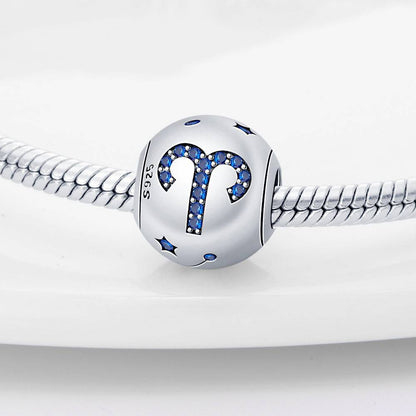 Aries zodiac charm in sterling silver with blue crystal accents, designed for durable and stylish personalized jewelry.