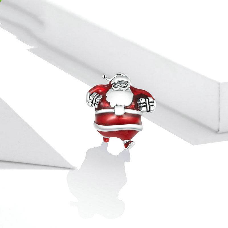 Santa charm on white background, holiday jewelry