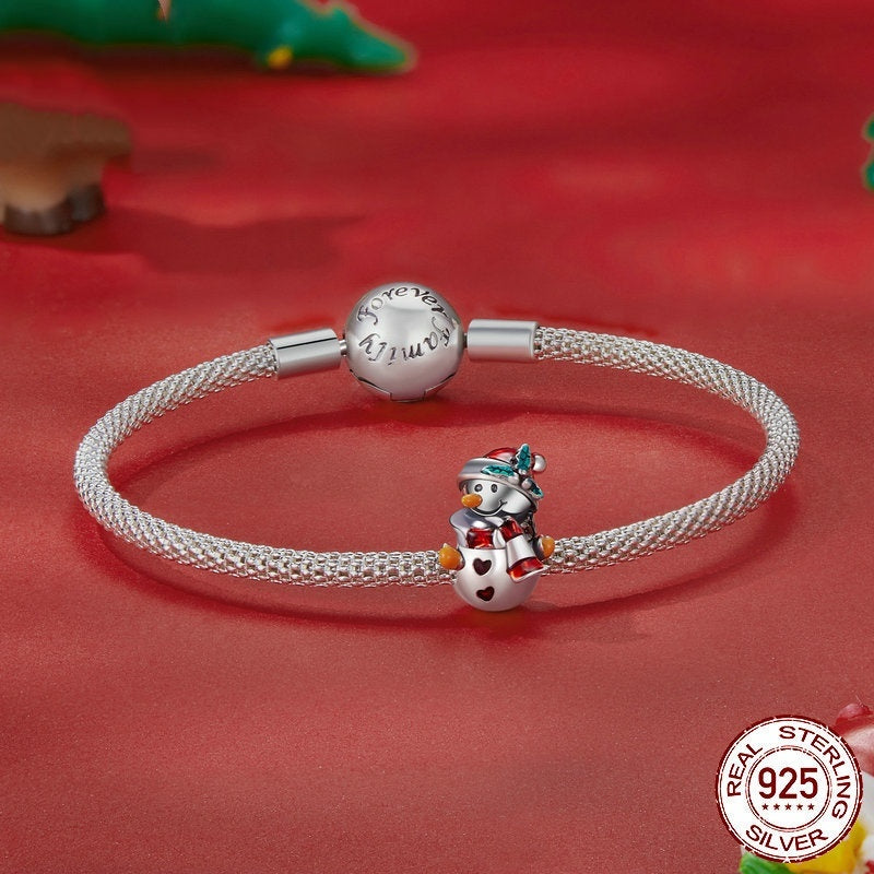 Snowman Charm - Festive Winter Collection | Christmas Jewelry featuring a sterling silver snowman charm on a mesh bracelet, perfect for holiday accessorizing.