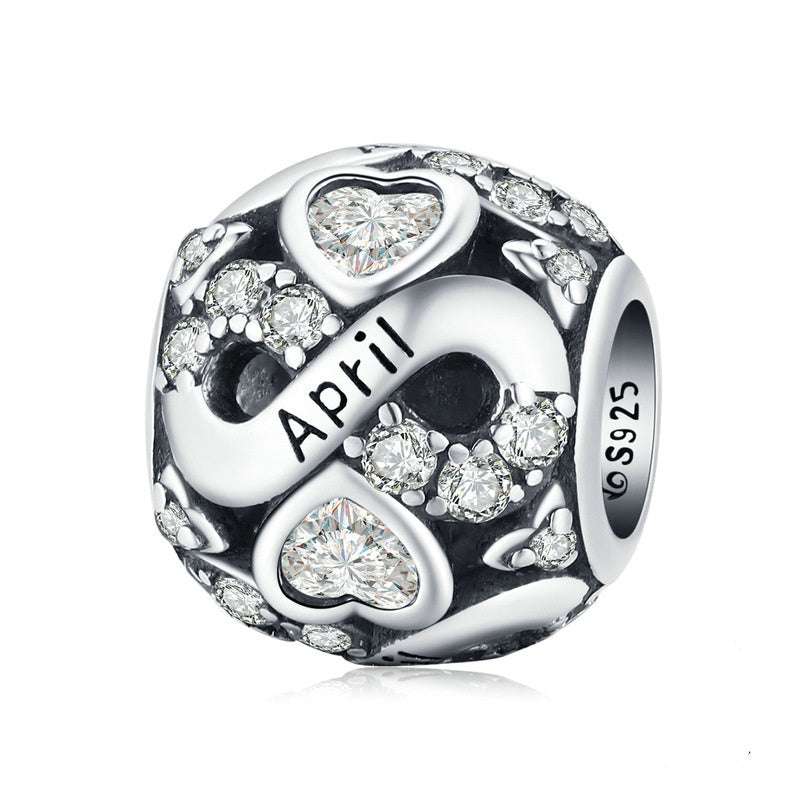 April Birth Month Charm with clear crystal hearts and infinity design, crafted in 925 sterling silver for personal jewellery collections.