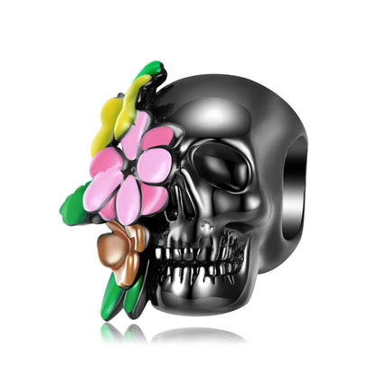 Floral Skull Head Charm - Edgy Style Accessory with intricate pink and green floral detailing on black skull, perfect for statement jewelry.