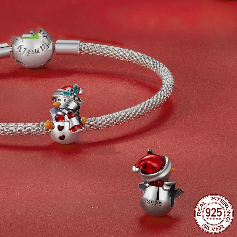 Snowman Charm - Festive Winter Collection | Christmas Jewelry featuring a sterling silver snowman with red heart and Santa hat, perfect for holiday bracelets.
