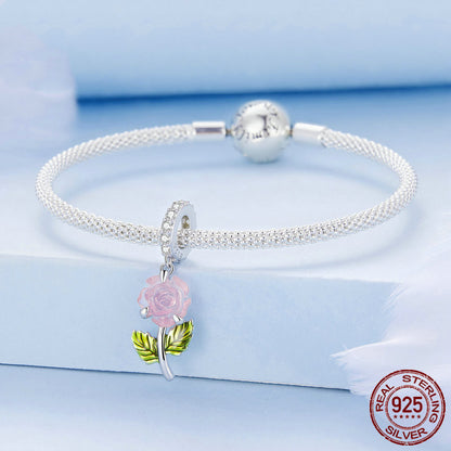 Bracelet with pink color-changing rose charm