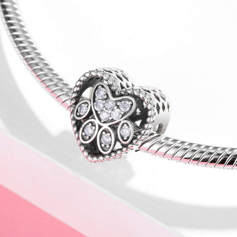 Heart paw print charm on bracelet