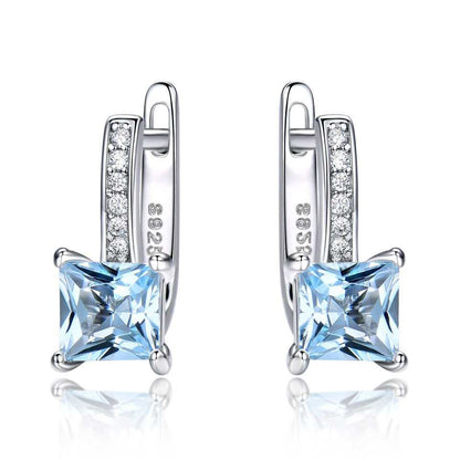 Sky Blue Topaz Earrings - Silver Craftsmanship featuring square-cut nano topaz and cubic zirconia on 925 sterling silver. Elegant and timeless design.
