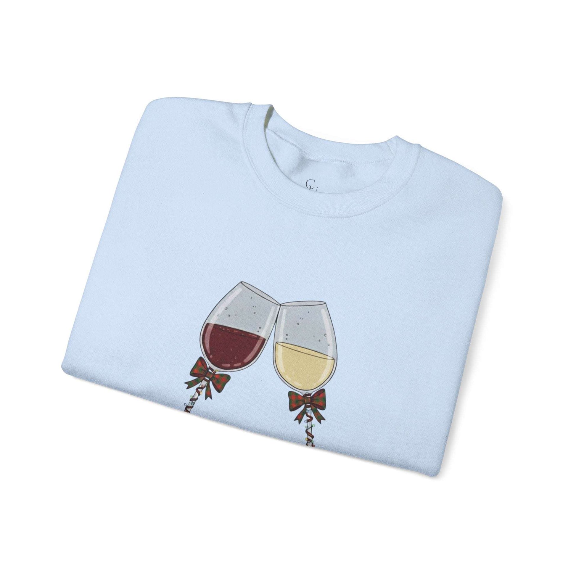 Women’s Christmas Wine Sweatshirt - Holiday Toast design with red and white wine glasses clinking, festive bows, cozy white crewneck.