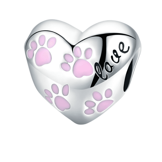 Heart-shaped Pink Paw Charm with sterling silver finish, featuring pink paw prints and 'love' engraving. A perfect accessory for pet lovers.