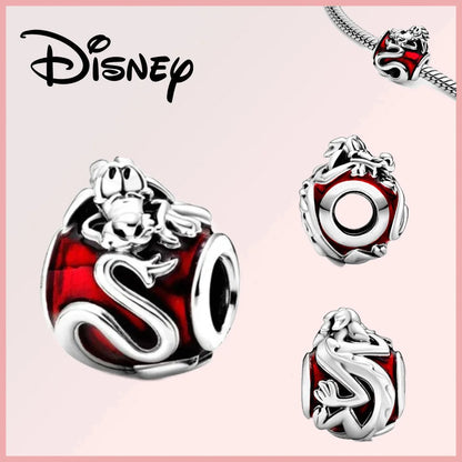 Limited Edition Disney Pixar charm featuring Mushu from Mulan on a red enamel sterling silver bead with zircon accents. Ideal for Disney jewelry fans.