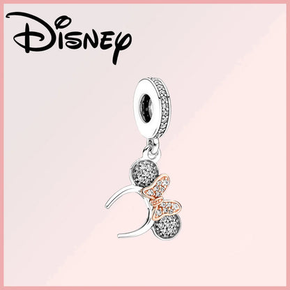 Disney Pixar Charms Collection (Limited Edition) sterling silver charm featuring Minnie Mouse ears with rose gold bow and zircon stones. Elegant Disney-inspired jewelry piece for collectors and fans.