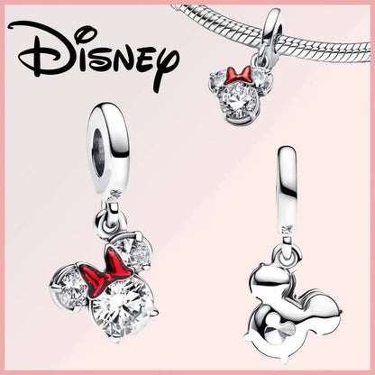 Disney Pixar Charms Collection (Limited Edition) featuring Minnie Mouse charm in sterling silver with red enamel bow and zircon stones.