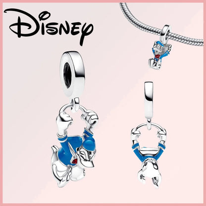 Limited Edition Disney Pixar charm featuring Donald Duck in sterling silver with blue enamel and zircon accents. Ideal for Disney-themed jewelry.