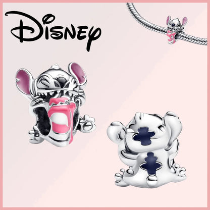 Limited Edition Disney Pixar Stitch charm in sterling silver with pink enamel and zircon details. Features playful Stitch design for charm bracelets.