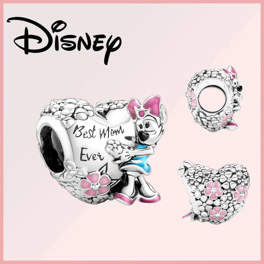 Disney Pixar Charms Collection (Limited Edition) Minnie Mouse heart-shaped charm in sterling silver with pink enamel flowers and 'Best Mom Ever' engraving.