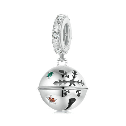 Silver charm with reindeer and snowflake design on a white background