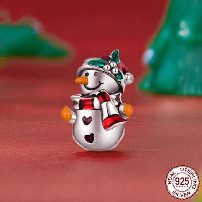 Snowman Charm from the Festive Winter Collection featuring a sterling silver snowman with red scarf and hat, perfect for Christmas jewelry lovers.