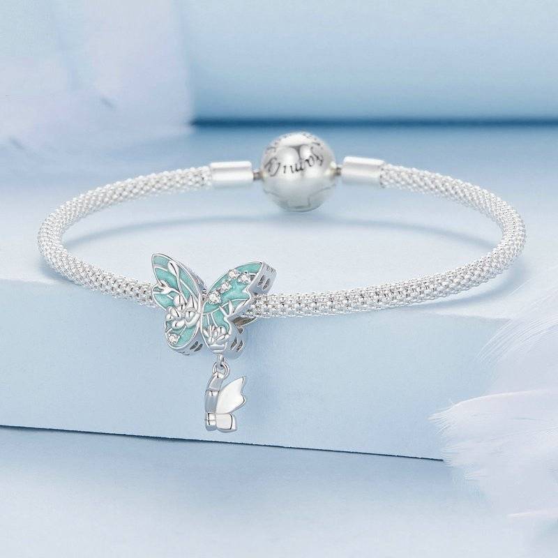 Floral Butterfly Charm on silver bracelet